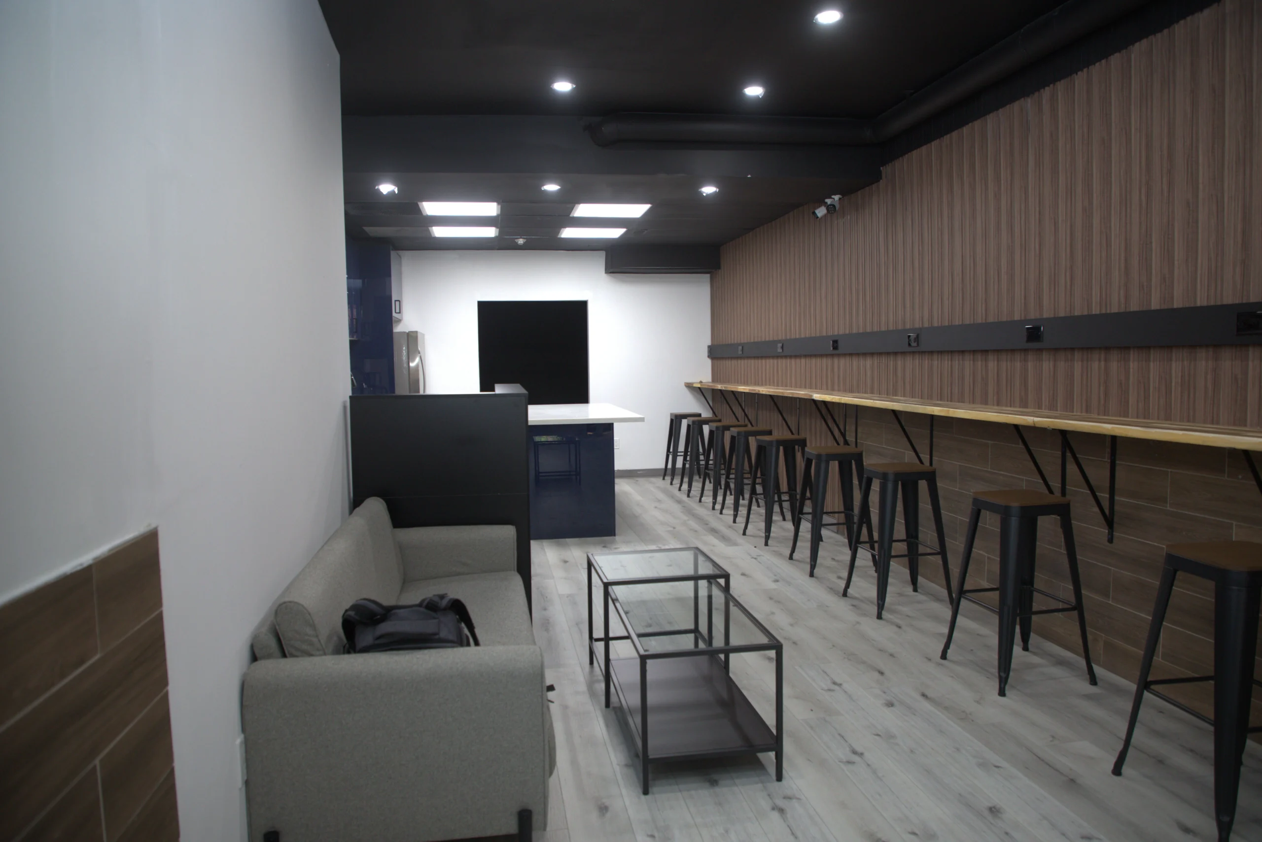 Guests gathering and working in a communal space